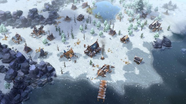 Gezeigt wird ein verschneites Wikingerdorf im Videospiel Northgard.