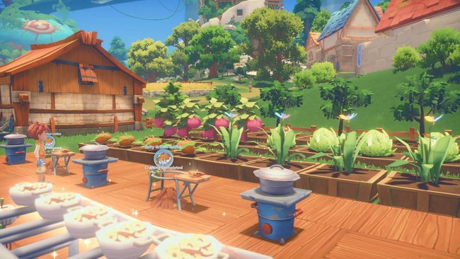 Gezeigt wird eine Spielszene aus dem Onlinespiel My Time at Portia, in der ein üppiger Gemüsegarten neben einem Schuppen zu sehen ist.